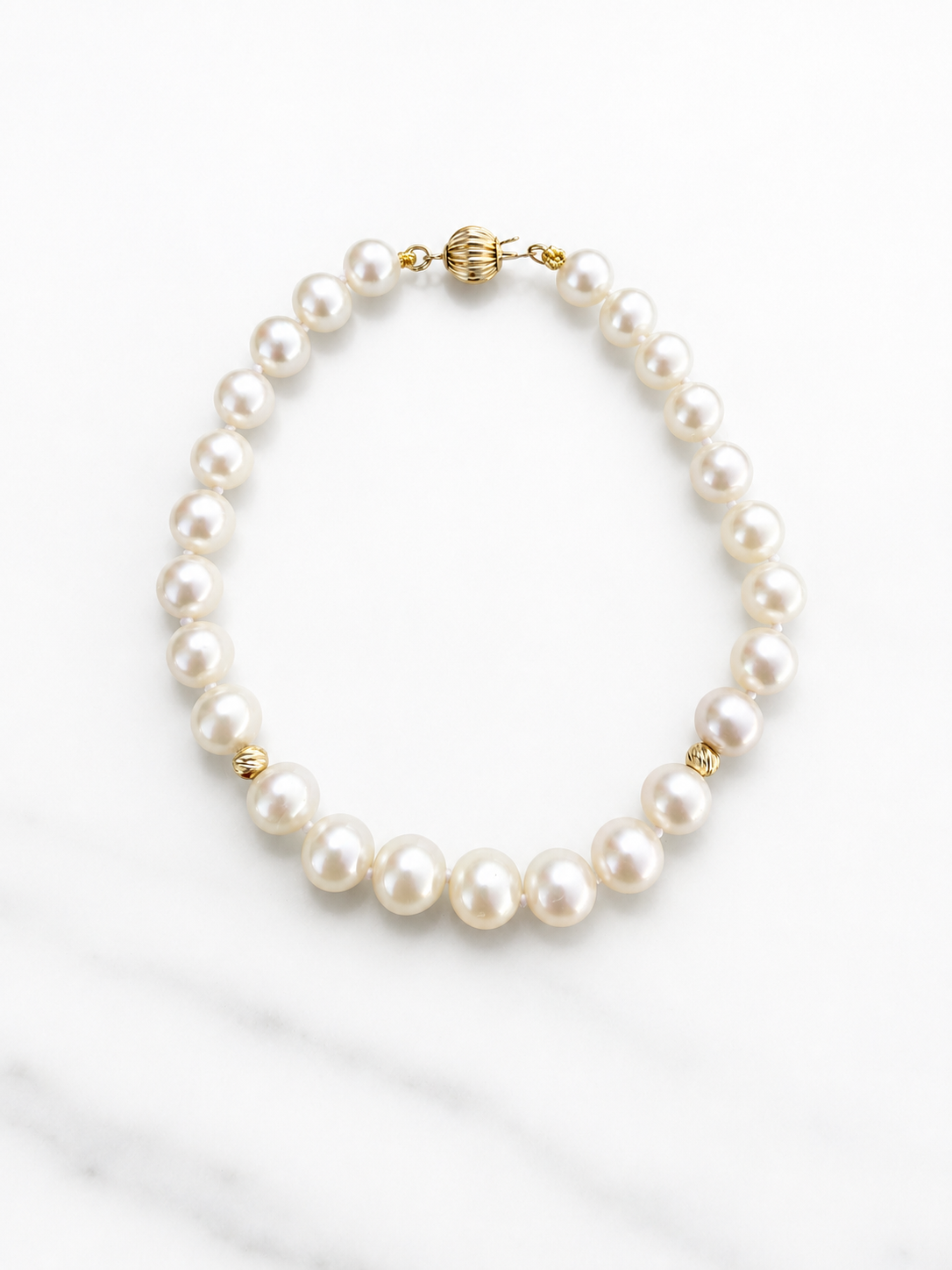 14K Gold Pearl Bracelet with diamond cut beads
