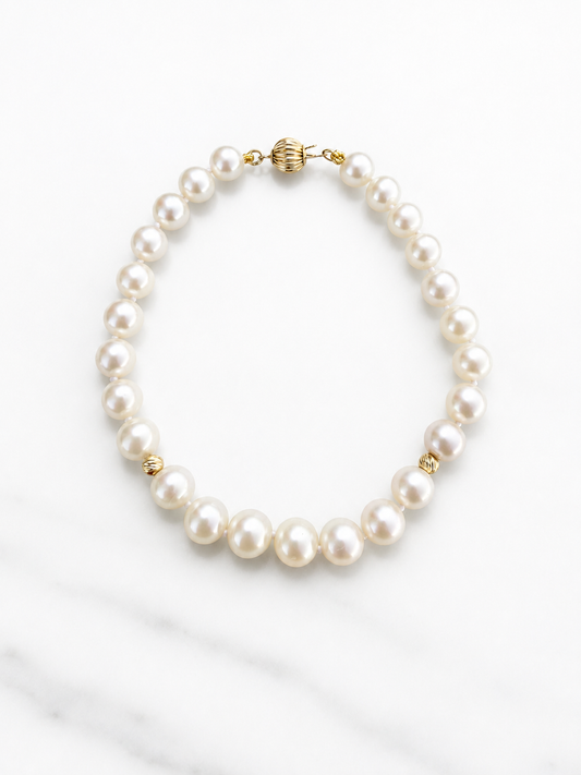 14K Gold Pearl Bracelet with diamond cut beads