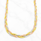 A three-tone braided chain necklace featuring interwoven yellow gold, silver, and rose gold links, displayed on a white marble background.