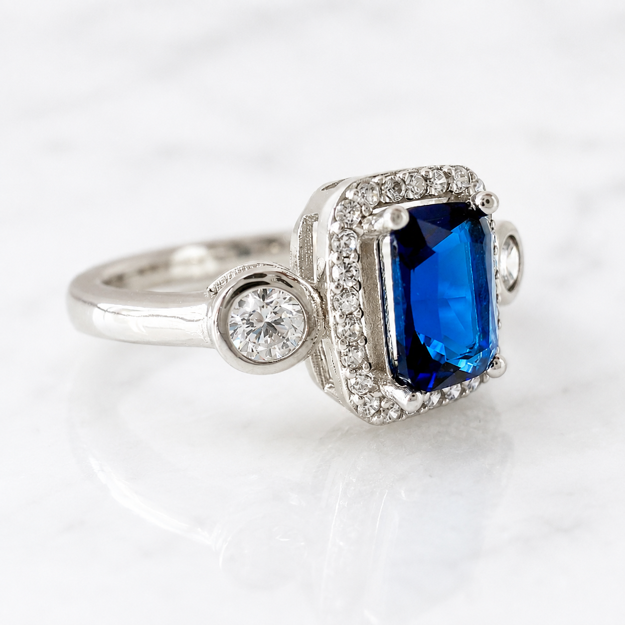 Sapphire Blue Emerald-Cut Halo Ring