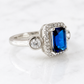 Sapphire Blue Emerald-Cut Halo Ring