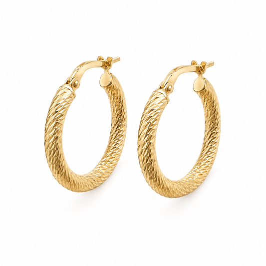 A pair of gold hoop earrings with a textured, rope-like twisted pattern, shown on a clean white background.