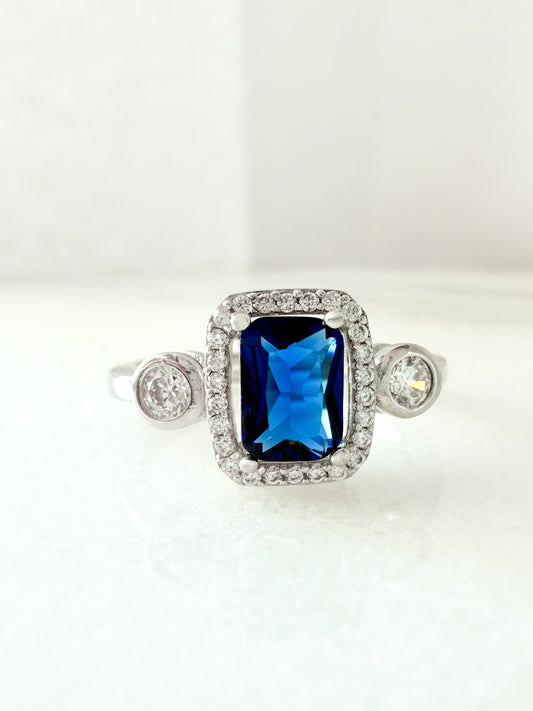 Sterling Silver Sapphire-Blue Rectangle Ring with Zircon Halo & Side Stones