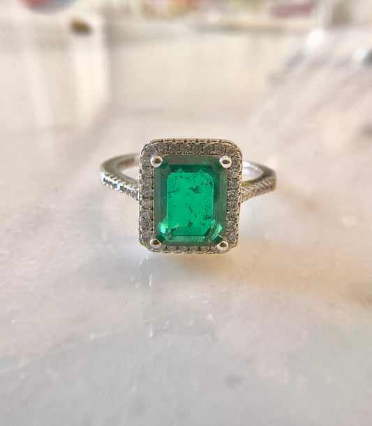 Rectangle halo emerald ring