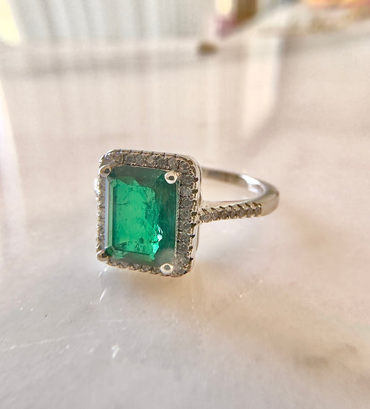 Rectangle halo emerald ring