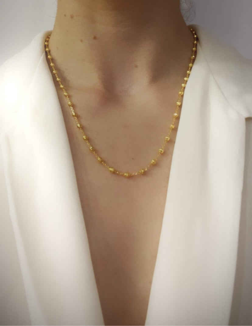 Gold bead necklace